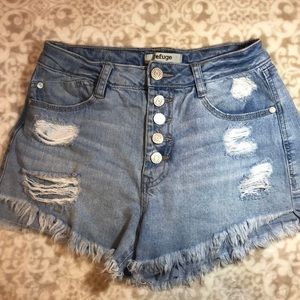 Refuge size 4 blue jean distressed shorts.